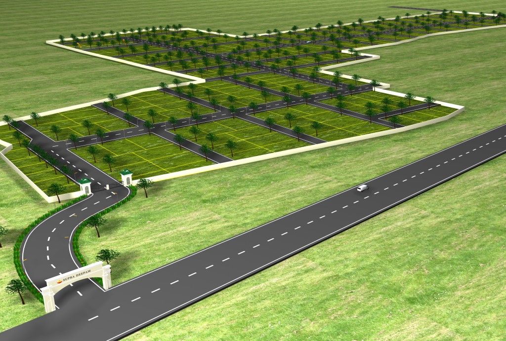 Aerial view of a planned gated residential layout with plotted parks, tree-lined internal roads and an entrance gateway
